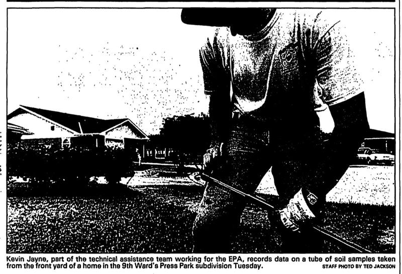 Newspaper clip showing EPA workers collecting soil in Gordon Plaza neighborhood.