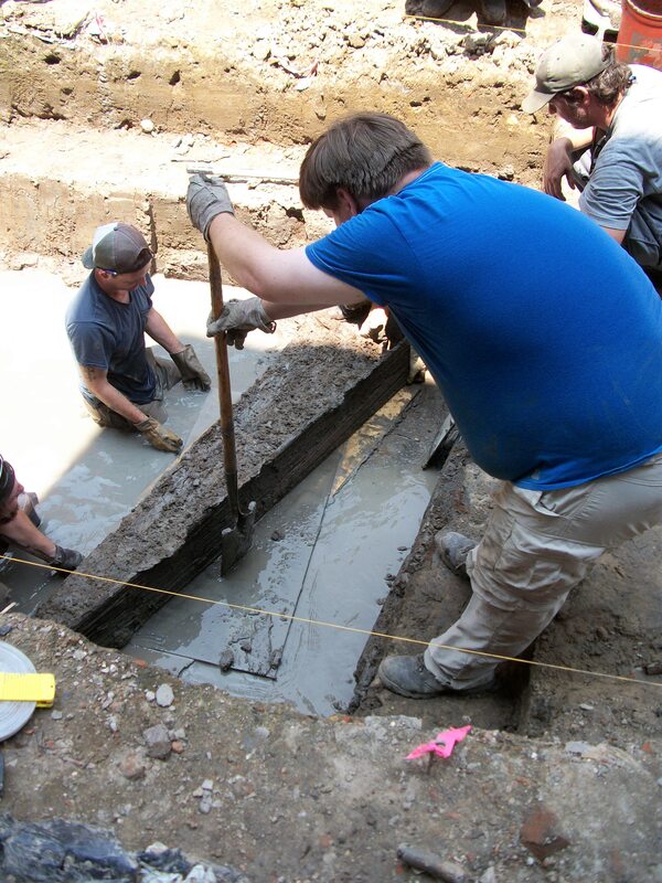 Archaeologists Prepare to Remove Coffin During 2011 Excavations